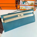 HERMES KELLY CUT 31 IN AZURE BLUE CALFSKIN WITH SILVER HARDWARE