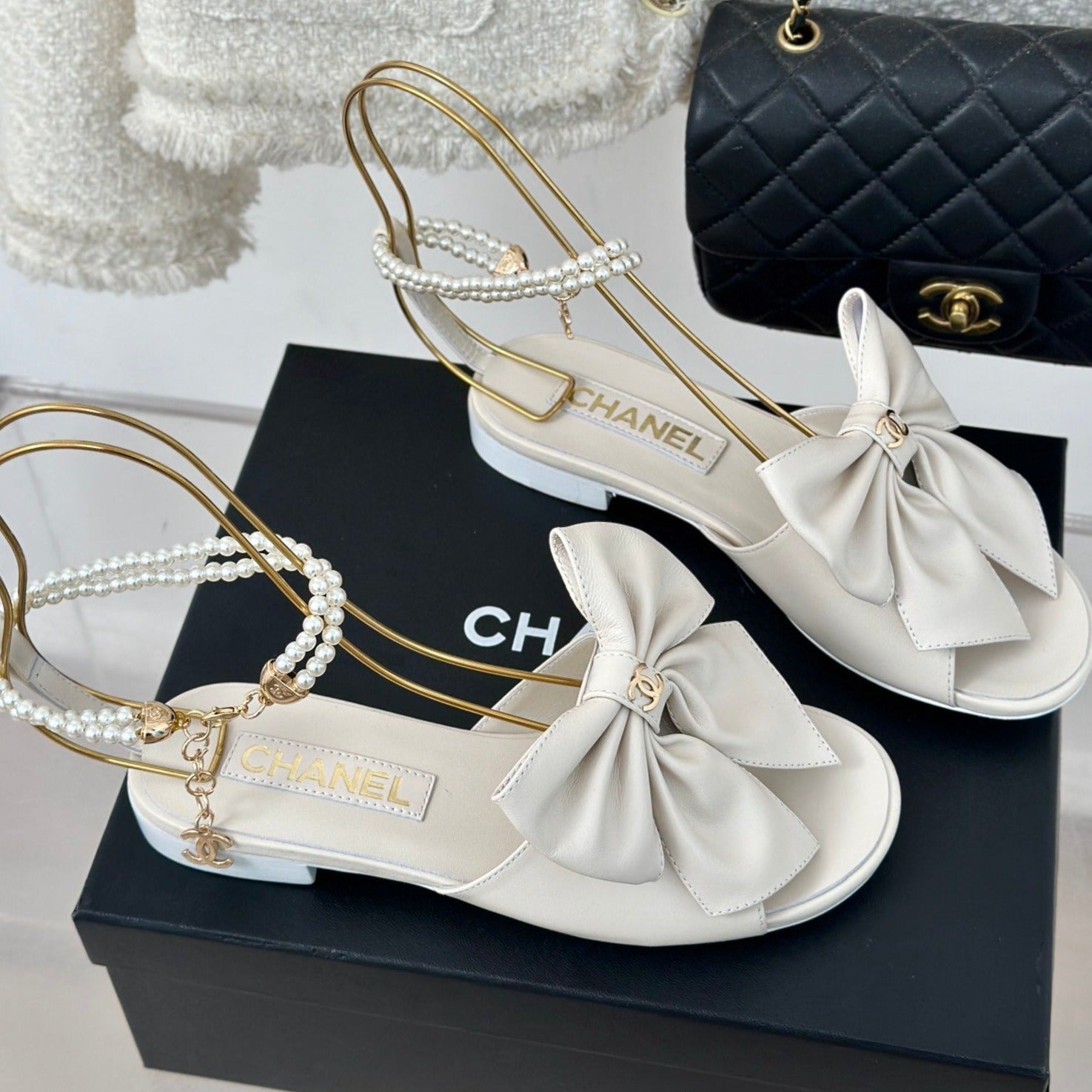 CHANEL Double C Big Bow Pearl Chain Sandals White Lambskin