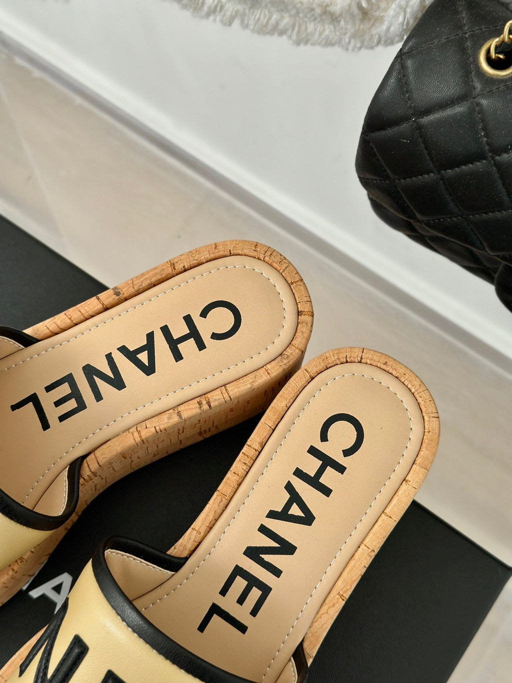 CHANEL THICK SOLE LETTER SLIPPERS IN DARK CREAM SHEEPSKIN