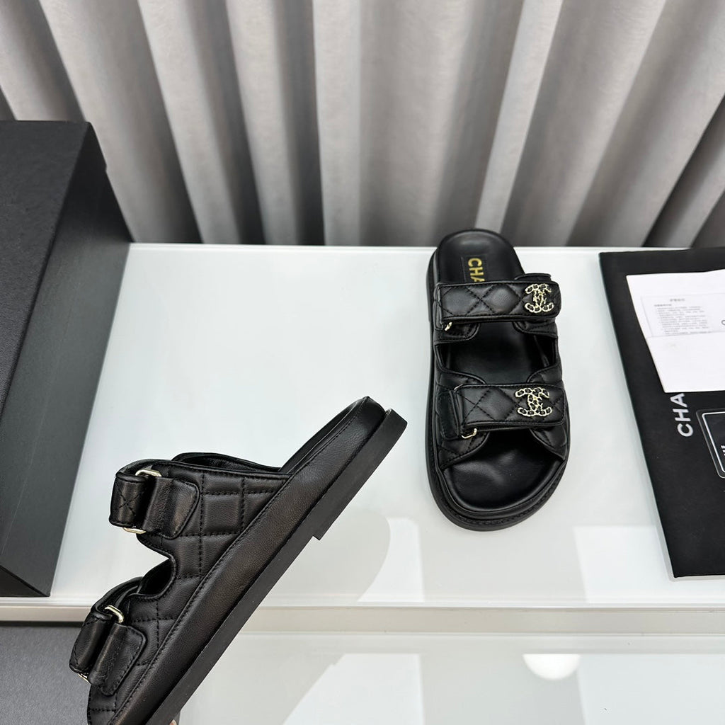 CHANEL dad sandals black lambskin mules